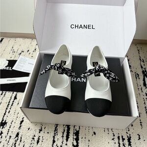 CHANEL Women's Black and White Logo Bow Flats